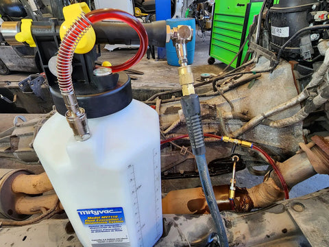 ATF Sealed Fluid Extractor And Refill Kit For Auto Trans Fluids, 2.5 Gallon Capacity, 10 Liter, in use in workshop setting