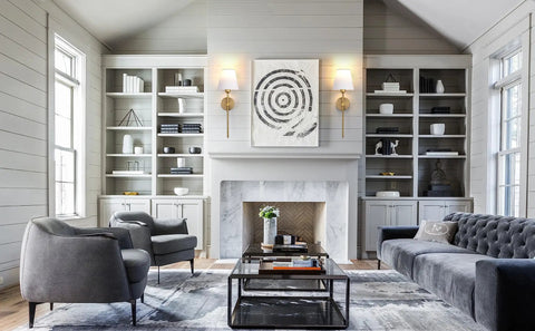 Living room with set of 2 dimmable wall sconces with remote control, plug-in, mid-century modern gold 21 inch wall lamps above fireplace.