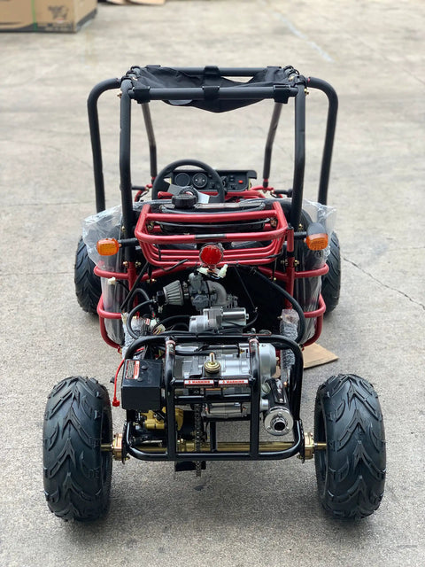 Rear view of a Kids 125cc Go Kart Raptor Style Fully Automatic With Reverse Blue Mid Size 4 Stroke, highlighting engine and tires.