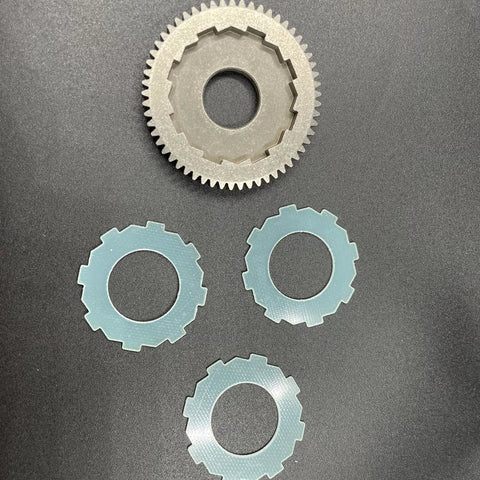 57T Spur Gear 0.8 Mod HD Steel Upgrade For 1X10 Arrma 3S BLX 4WD Models with slipper pads on black background