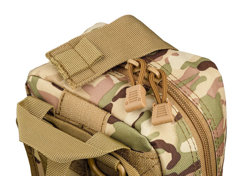Scherber Premium IFAK trauma pouch in camouflage with MOLLE webbing and tan zipper pulls; close-up view.