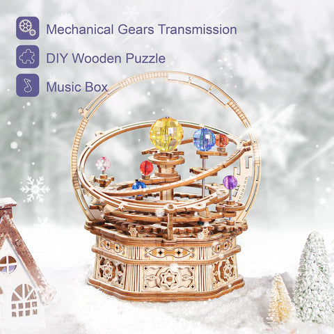 Festive scene of Dope 3D Wooden Puzzle Music Box Kit For Adults Orrery Solar System Mechanical Model with snowy backdrop