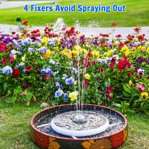 Solar Powered Bird Bath Fountain With Six Point Five Watt Solar Panel And 3000mAh Battery in garden with colorful flowers.