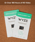 Two Wyze 128GB MicroSDXC Card Class 10 U3 for security cameras and dash cams, packaging on cork board.