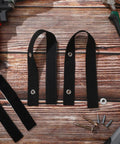 Heavy Duty Anti Tip Furniture Straps 6 Pack Rock Solid Wall Anchor Brackets For Dressers Tv Shelves Pet Proofing Adjustable Nylon Safety Gear Black on a wooden surface.