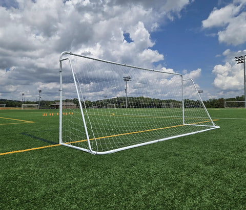 Regulation Size 24 By 8 Soccer Goal With Steel Frame, Heavy Duty Portable Pro Grade Practice Net Included on soccer field