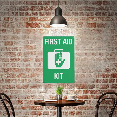 Emergency Medical Supplies Sign for office or home use displayed on a brick wall above a table, rugged aluminum with high-visibility letters.