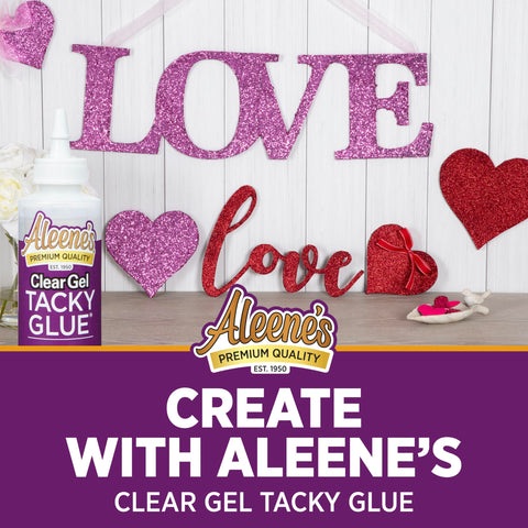 Clear Gel Tacky Glue For Crafts And Slime, 4 Oz Bottle, Water Cleanup, Dries Quick, next to decorated 'LOVE' craft display