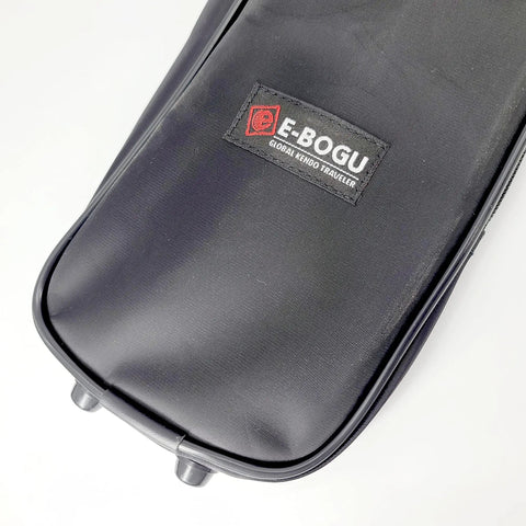 Black utility martial arts stick bag for shinai and bokken, 51 inch case, close-up showing durable material and logo.