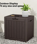 Weatherproof 31 Gallon Deck Box With Lockable Lid for outdoor patio garden and backyard storage shown on a patio.