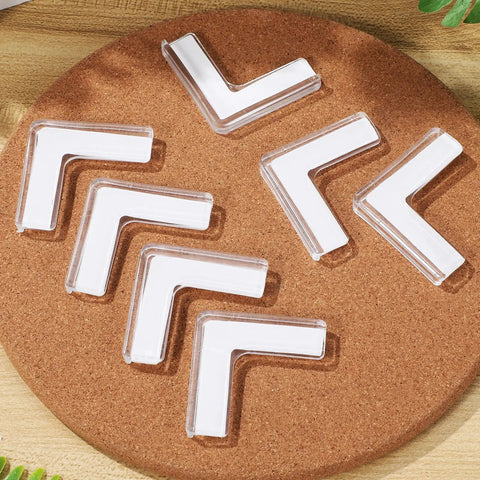 Eight Pack Silicone Corner Protectors for Baby Proofing and Home Safety Edge Guards on cork surface