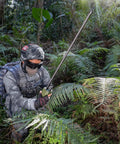 Person using Dual Band Ham Radio Antenna Foldable 42.5 Inch 136-520MHz CS Tactical SMA Female Omni Directional 3.5dBi in forest