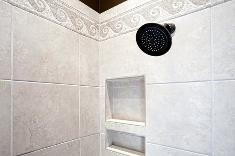 No-Brainer Tile Niche Recess For Bathrooms 14 By 14 Inch Preformed Shower Shelf with decorative tiling and wall mount showerhead