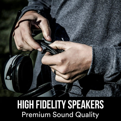Person holding worktunes connect hearing protector with bluetooth audio, am fm radio, 24 db nrr, built in microphone for hands free calls