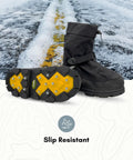 Dope Solid Glacier Trek Spike Boots With Heel Cleats Deliver Mean Ice And Snow Traction For Rough Outdoor Grinds Featuring Waterproof Nylon Uppers And Thirty Two Swappable Metal Spikes Plus A Wrench In Black Size Eleven showing slip-resistant sole on snowy ground.