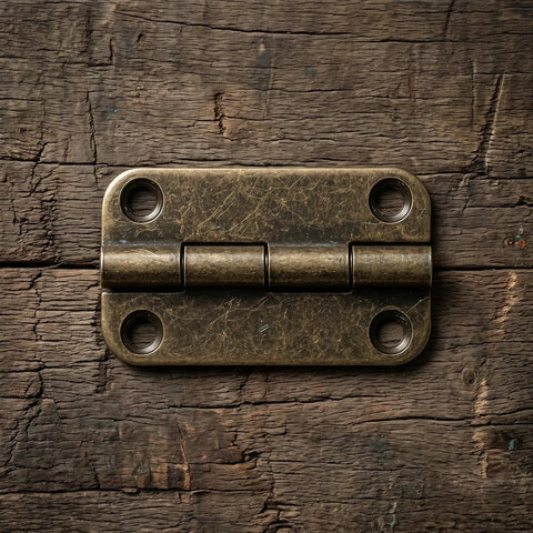 12 Pack Small Iron Hinges With Rounded Corners 1.4 Inch Antique Bronze Cabinet Butt Hinges on wood surface four-hole view