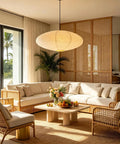 20 Inch Oval Paper Lantern Pendant Light White Rice Paper Ceiling Lamp Japanese Style diffused glow in a stylish living room.