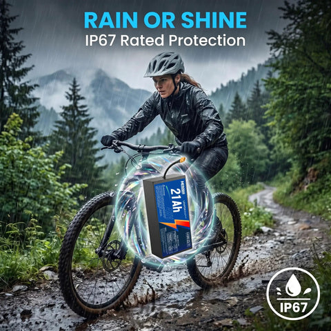 High Output 48V 21Ah LiFePO4 Battery Featuring Auto Grade Cells And A Badass Alloy Armor Shell, in use during rain on a mountain bike.