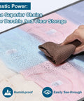 Two Pack Under Bed Storage Bins With Humidity Proof Clear Plastic See Through Design shown in close-up with hand wiping surface
