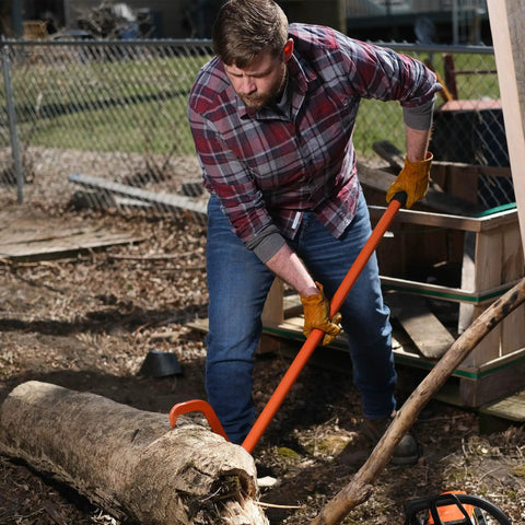 Man using Heavy Duty Timber Jack Log Lift And Cant Hook For Felling And Logging, Raises Logs Up To 11 Inches Off Ground