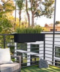 Badass Weatherproof Railing Planter Box With Secure Mounting Bracket Hella Durable Plastic Stone Composite on balcony with grass.