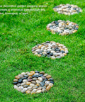 Polished River Rock Stepping Stones For Garden Pathway With Mesh Backing Nine Inch Pebble Paver Mats on grass