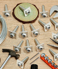 20 Piece Aluminum Anchor Wire Vise Set With Screws For Tightening 8 To 11 Gauge Wire, tools and material shown on wooden background.
