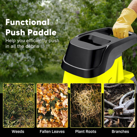 Close-up of 50L Collecting Bin Yard Waste Chipper Shredder With 15 Amp Electric Motor 25 To 1 Reduction part with push paddle in use.