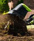 Corded Electric Garden Tiller Cultivator with 12.5 Amp Motor, 16 Inch Tilling Width, and Six Steel Tines in action, black.