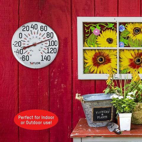 Metal Wall Thermometer For Indoor And Outdoor Use With 12 Inch Dial And Easy To Read Large Numbers Ideal For Patio Pool Or Indoor Spaces Weather Resistant And Shatterproof Construction, mounted on red wall