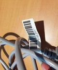 Heavy Duty Power Cord 51853101 Used Industrial Electrical Cable on wooden surface with barcode tag visible