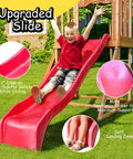 Child sliding down red wave slide on Wooden Backyard Playset With Monkey Bars And Wave Slide For Kids Ages 3 To 6 Includes 2 Belt Swings Climbing Ladder Rock Wall Play Deck And Canopy Roof For Outdoor Fun