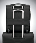 Rear view of Solyte DLX Softside Underseat Luggage With Smart Sleeve, Right Height Pull System, Inline Skate Wheels, Midnight Black