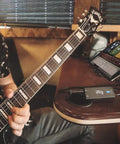 Musician using Guitar Audio Interface For iPhone iPad Mac PC With 24 Bit 96 Kilohertz Recording USB C Lightning And USB Cables