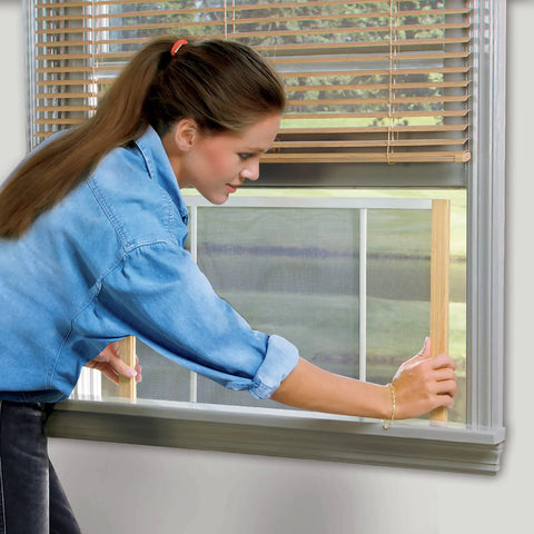 Adjustable Window Screen For 15 To 25 Inch Openings, 10 Inch High, No Tool Needed Setup being installed in a window by a person