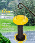 Outdoor Finch Feeder For Nyjer Seed Tube With Metal Mesh 13 Inch Length Weatherproof Roof And Tray 2 Lb Capacity Hanging Bird Feeder For Backyards Yellow in rain.