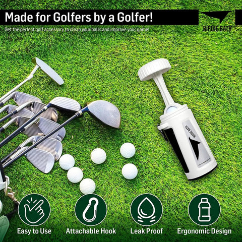 Portable Golf Ball Cleaner For On Course Use Personal Ball Washer on grass beside golf clubs and balls