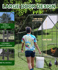Person entering large outdoor walk-in metal chicken coop with cover and perch. Large door design highlighted with chickens inside.