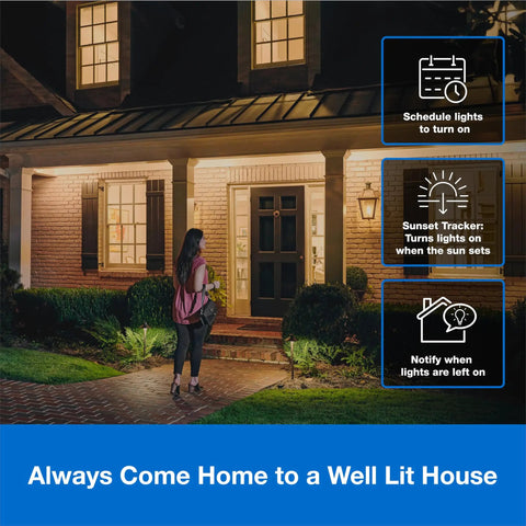 Smart Light Switch Kit With Wall Plate And Hub Plays Nice With Alexa Google Home And Apple HomeKit Single Pole Or 3 Way 5 Amp Neutral Required Control Multiple Lights From One Switch, nighttime image of a well-lit house exterior illustrating smart lighting features.