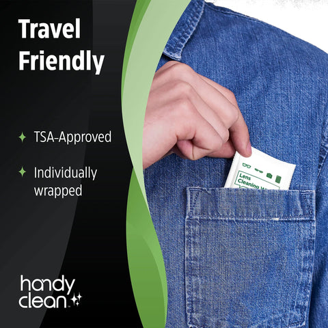 Front pocket view of HandyClean lens cleaning wipes in white, individually wrapped, being placed into a denim pocket