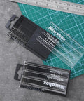 40 Pc Mini Drill Bit Set 0.3Mm To 1.6Mm High Speed Steel HSS Tiny Shank Full Ground Twist Bits in two plastic cases on cutting mat
