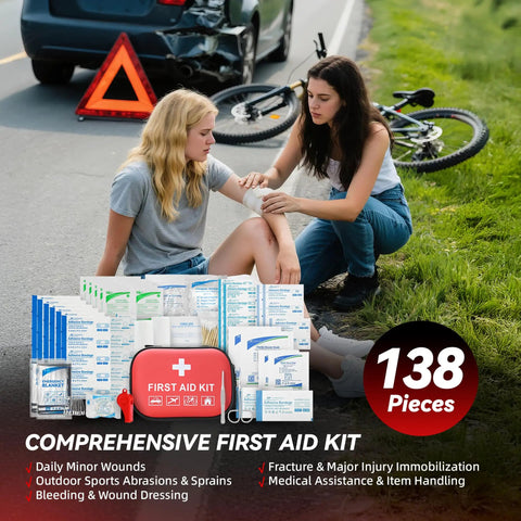 Two women using a comprehensive first aid kit by a roadside with a bicycle; includes medical items for injury treatment, 138 pieces.