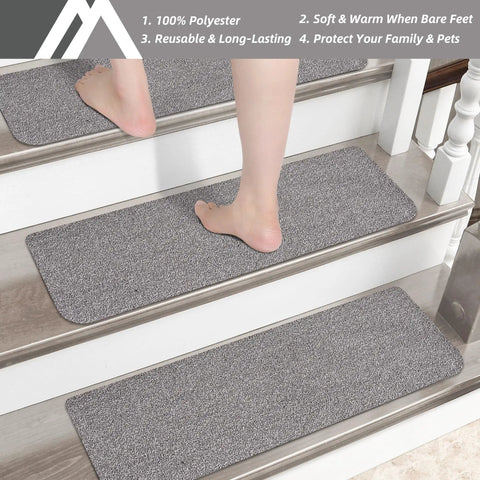 Person walking on Non Slip Stair Treads 15 Pack Carpet Mats For Indoor Stair Runners 28 By 9 Inches Grey 100 Percent Polyester With TPE Backing Protect Floors And Keep Kids And Pets Safe on indoor stairs