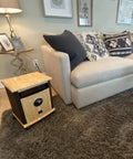Portable Electric Space Heater That Cranks Up The Heat With 1500 Watt Infrared Quartz Elements next to beige sofa
