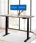 Electric Stand Up Desk Frame With Dual Motor And Three Stage Lifting For Smooth Height Adjustment Includes Four Memory Preset Keypad Fits Tops To 78 Inches Long Heavy Duty Steel Build Supports Up To Two Hundred Sixty Four Pounds Perfect For Modern Home showing dual monitors on a wooden top.