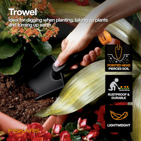 Ergonomic Hand Trowel With Oversized Head For Digging And Planting In Tough Soil, Fiber Composite Garden Tool with hand in lush garden