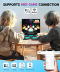 Children playing 9 Pad Electronic Drum Set With Dual Speakers Portable MIDI Practice Kit For Beginners at a table with devices.