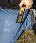 Man taking out Nine Hex Keys Allen Wrench Set With Secure Bolt And Nut Assembly from pouch for archery gear maintenance