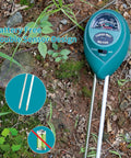 Three In One Soil Tester For Moisture Light And pH With Easy To Read Results And No Batteries Needed Perfect For Indoor And Outdoor Plants Gardens Lawns Farms And Balconies placed on soil with grass, showing dual sensor design.
