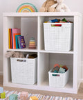 Set Of 4 Large Cube Storage Baskets With 17L Capacity, Jute Look Resin Bins in a white cube shelf, organized with toys and books